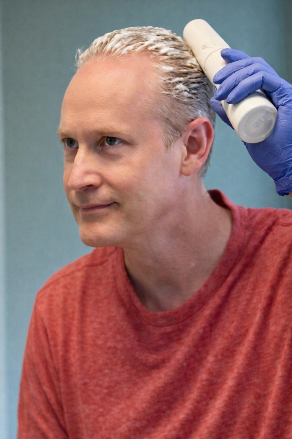 Customer applying ME hair color